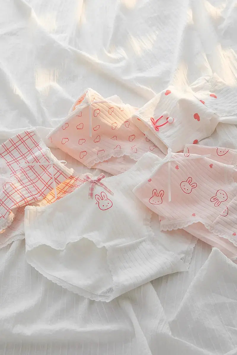 5-piece cotton underwear set with pink-patterned briefs, lace trim and bow accents