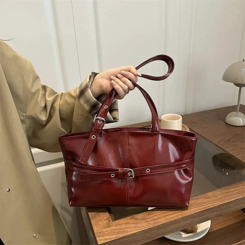 Handbag in burgundy soft leather with belt-buckle detail, dual top handles, Korean-style casual shoulder bag
