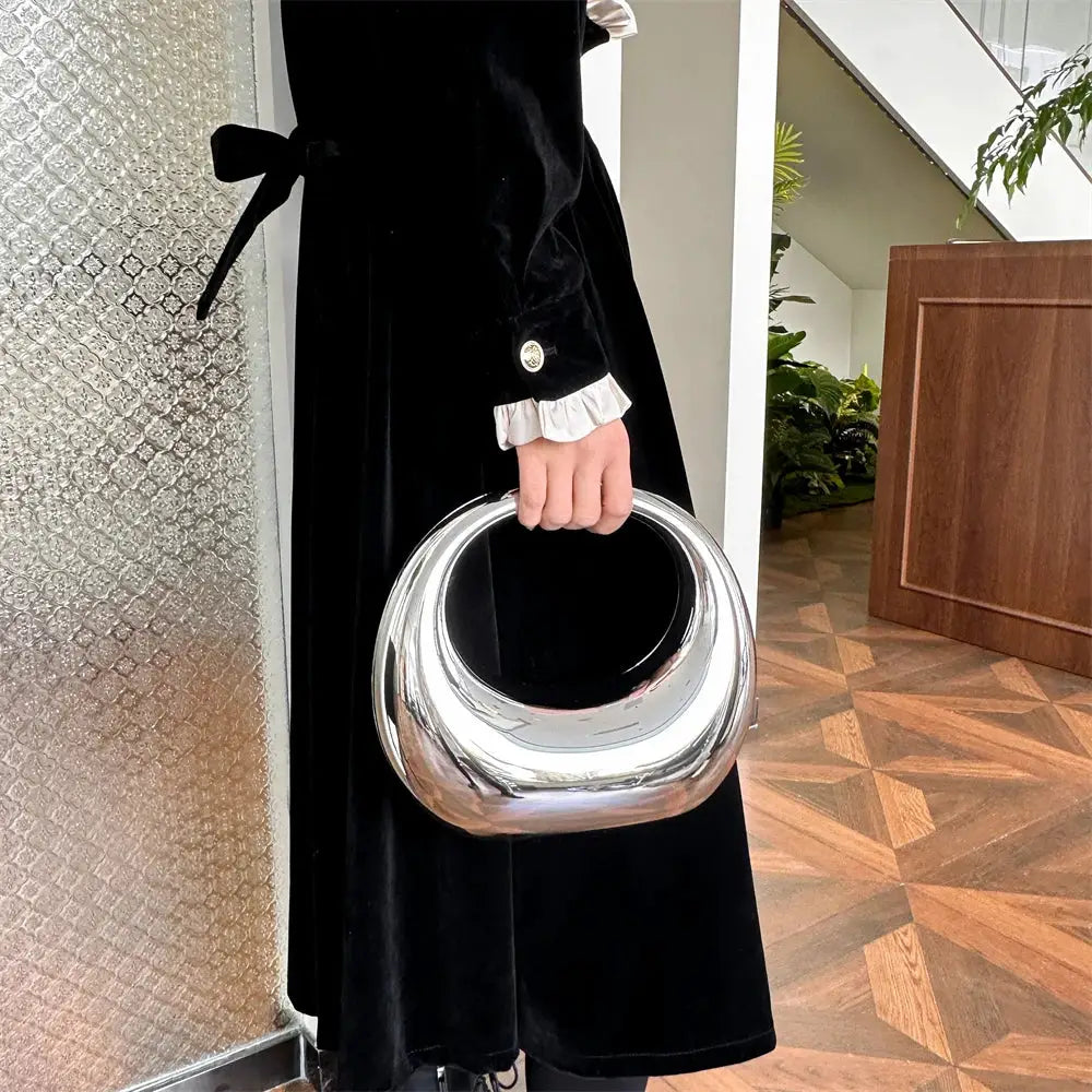 MOODS silver round-handle PVC wrist bag clutch for evening events