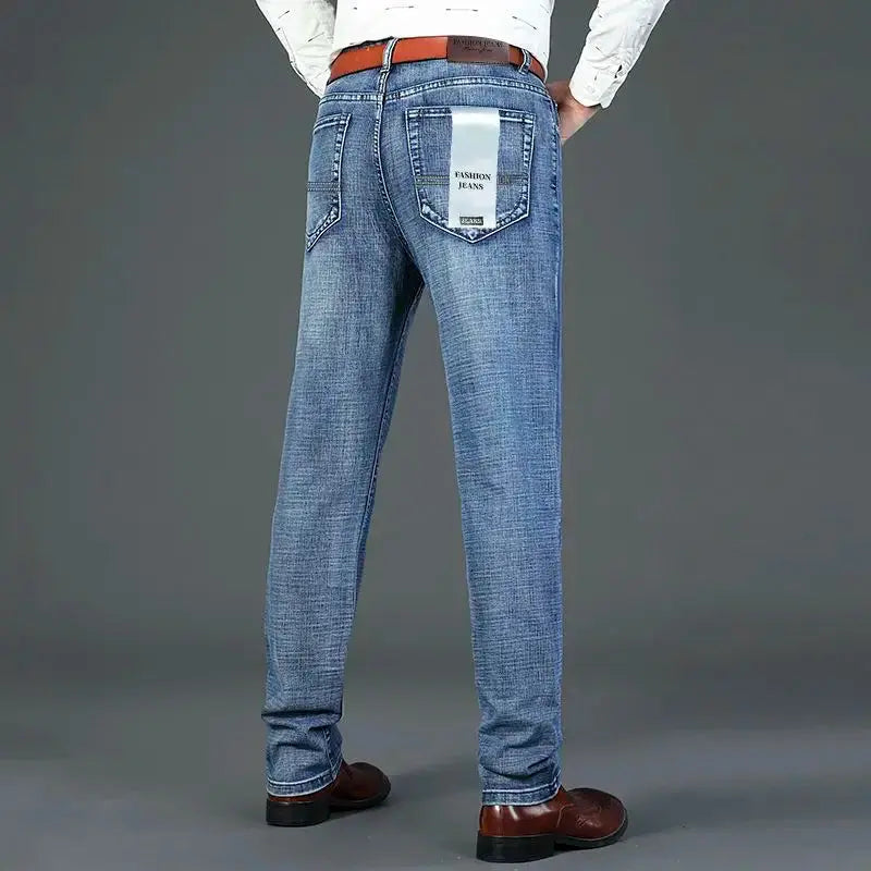 Men's blue denim jeans, straight-leg fit with back-pocket patch tag
