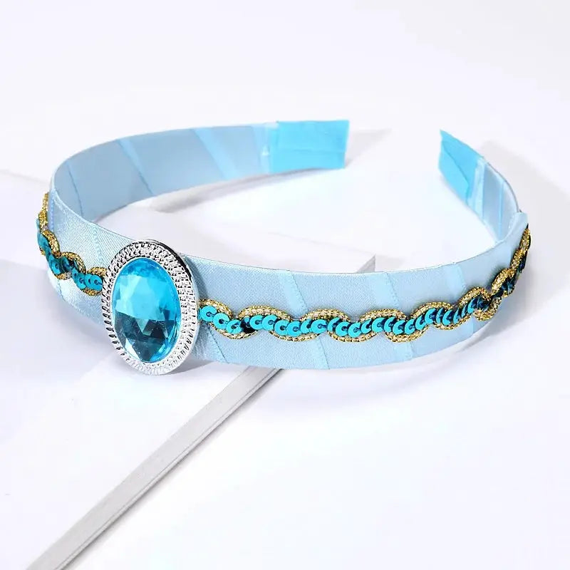 Elsa princess crown headband for kids with large blue gem centerpiece and blue-gold chain trim