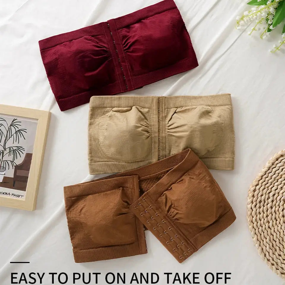 Plus-size strapless bandeau bra set of three in burgundy, beige, and brown with seamless wireless front-closure.