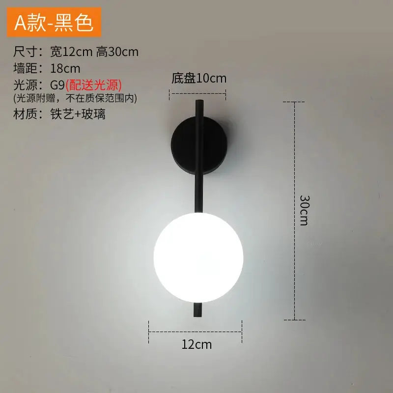 Black metal LED glass wall lamp with round glass globe, 30 cm tall, 12 cm wide