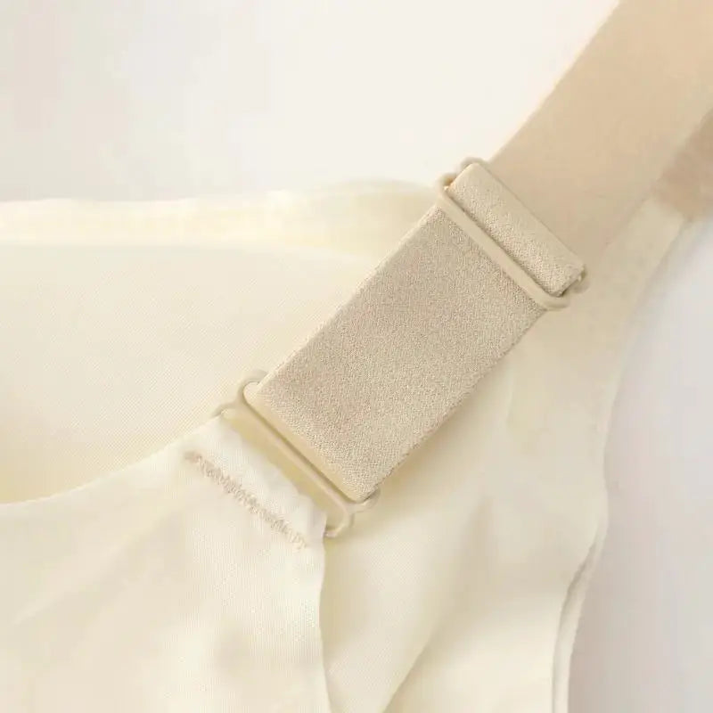 Cream seamless bra with adjustable strap slider for a comfortable wireless fit