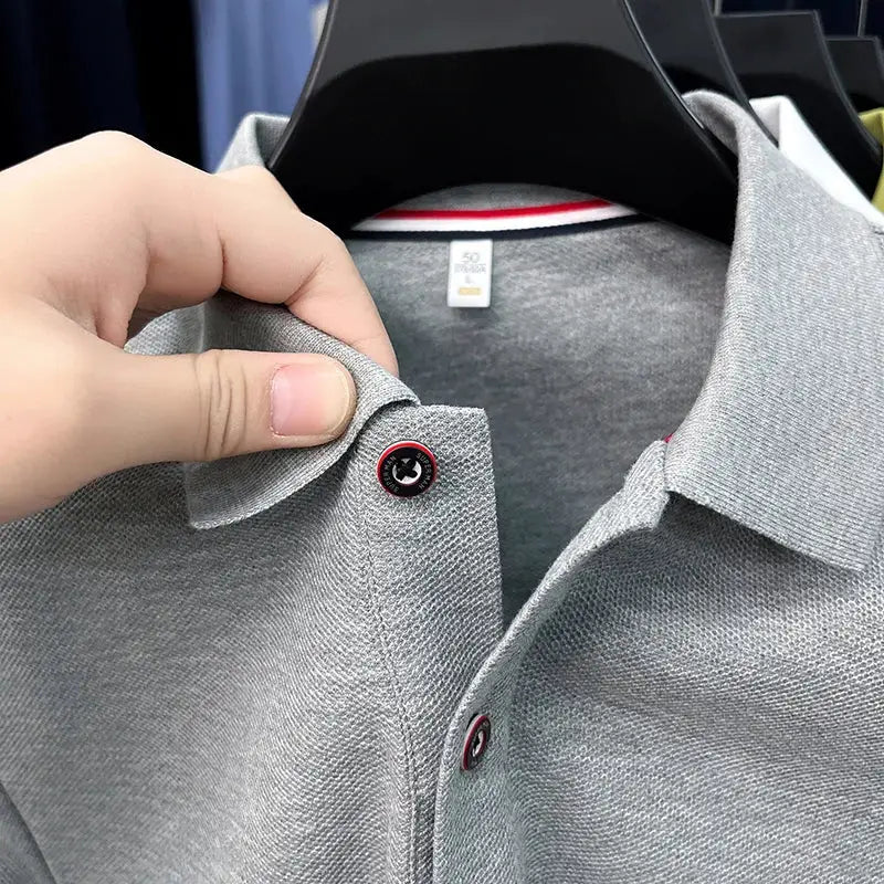 Men's grey polo shirt by Simples Market, short sleeves, textured knit, red-ring button accents