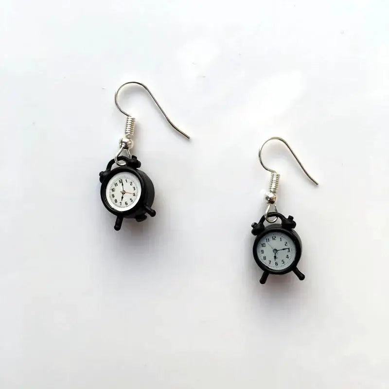 Mini clock earrings by Simples Market; black vintage-style alarm-clock charms on silver hooks (set of 2)
