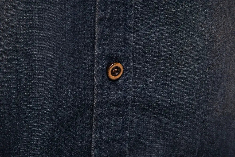Men's elastic cotton denim shirt by AIOPESON, dark indigo denim with brown button close-up