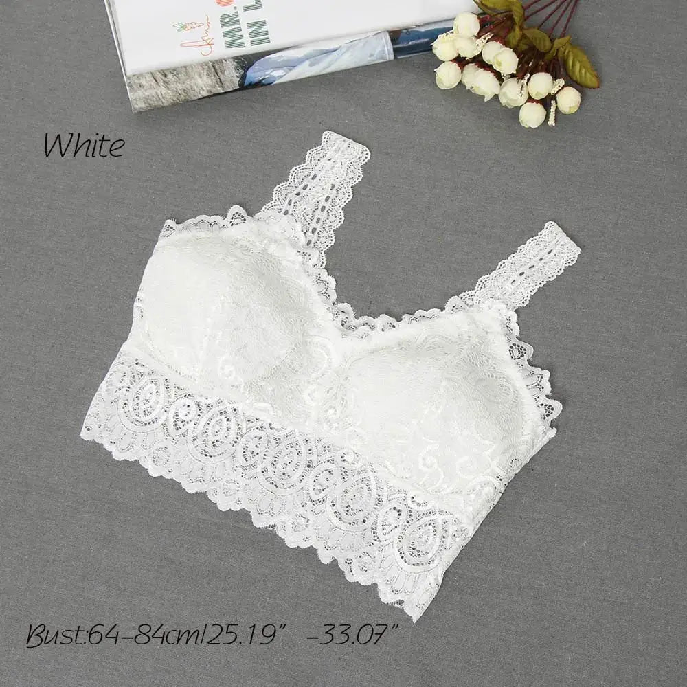 White lace padded bralette with floral crochet pattern and scalloped hem