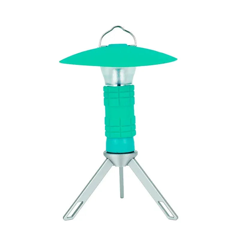 Portable teal camping lantern with textured grip and three-fold tripod legs.