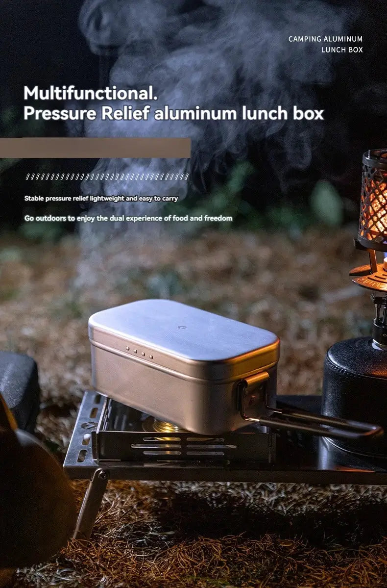 CAMPINGMOON aluminum lunch box on a portable open-flame camping stove outdoors