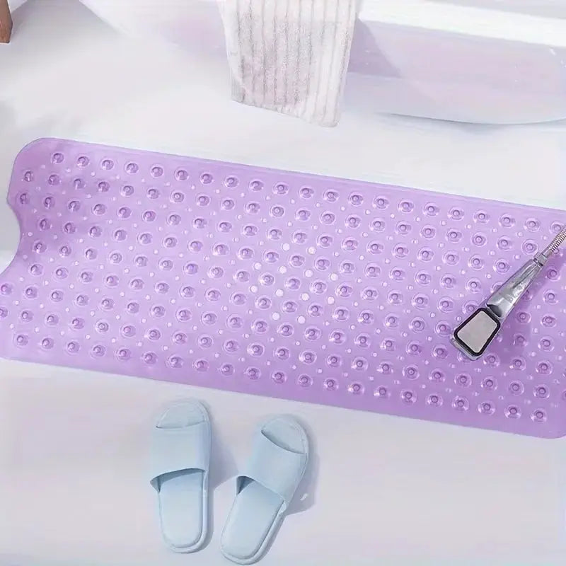 Simples Market purple non-slip shower mat with suction cups; 2 light-blue slippers nearby