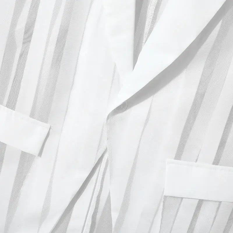 Men's white striped mesh vest with sheer vertical stripes and one-button front