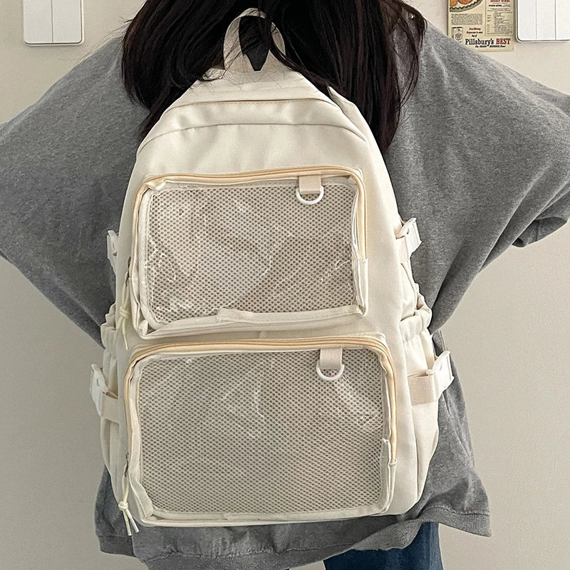 Japanese style ita backpack by Simples Market in cream with two mesh front pockets