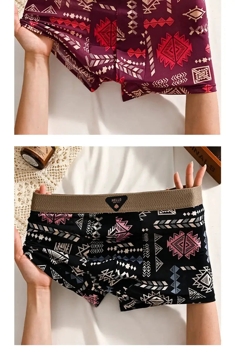 Men's boxer shorts; two pairs with maroon and black geometric prints and a beige HELLO waistband.