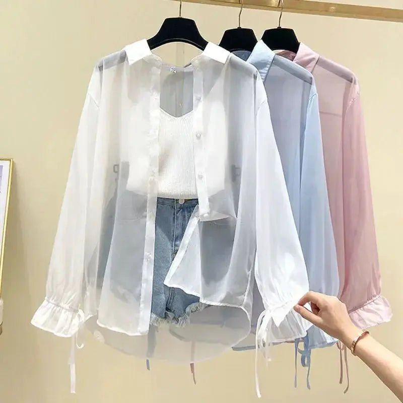 Smvp chiffon blouses for women in white, blue, and pink on hangers; sheer, loose button-up with bow lace-up cuffs.