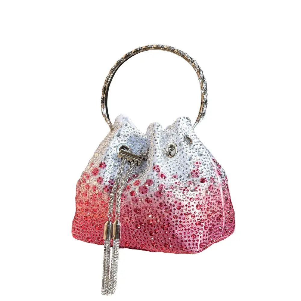 Simples Market rhinestone-handle evening clutch bag with gradient pink-to-white crystal embellishments