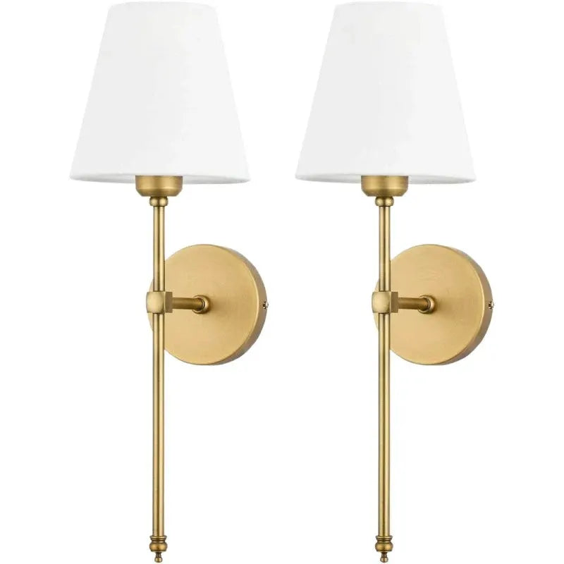 Pair of brass wall sconces with white cloth shades for bathroom or bedroom decor