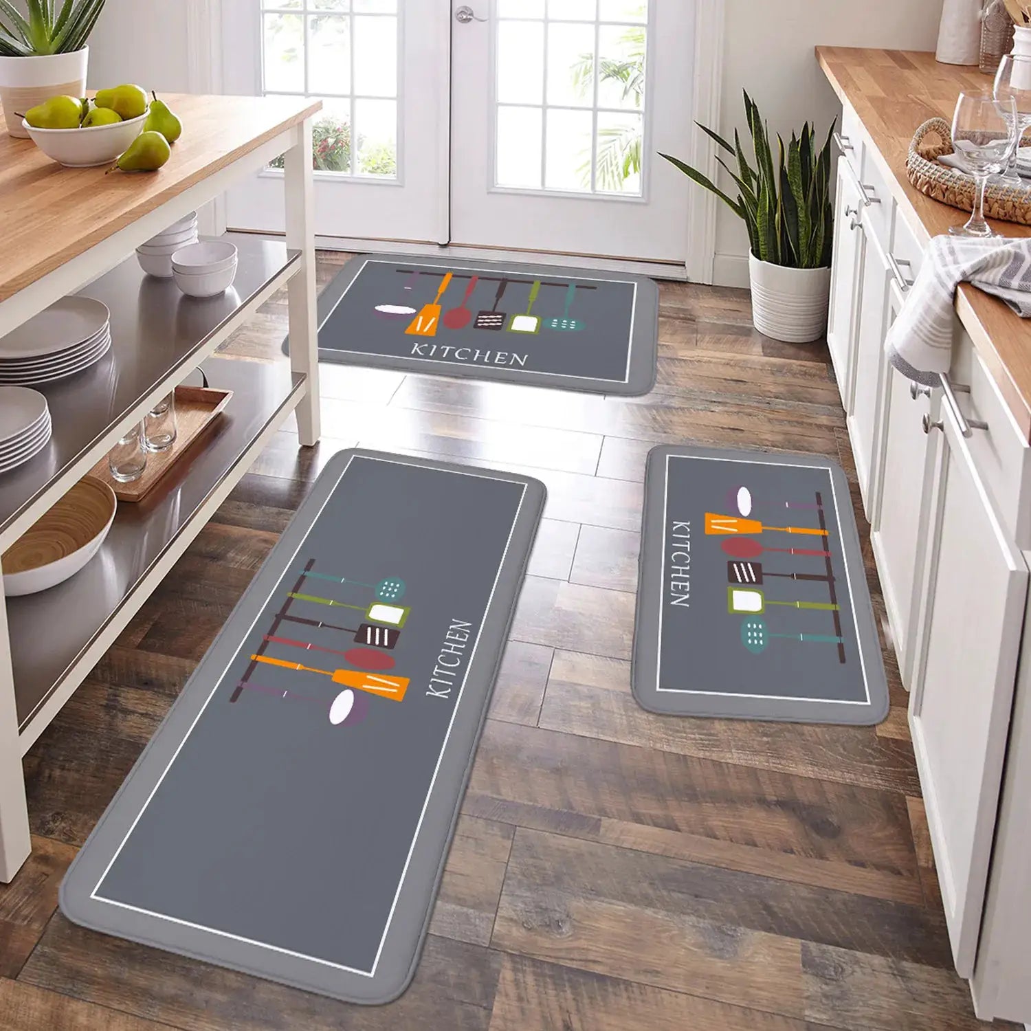 3-piece kitchen mat set in grey with utensil graphics and KITCHEN text; moisture-absorbing, anti-skid, machine-washable.