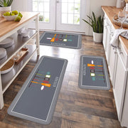 3-piece kitchen mat set in grey with utensil graphics and KITCHEN text; moisture-absorbing, anti-skid, machine-washable.