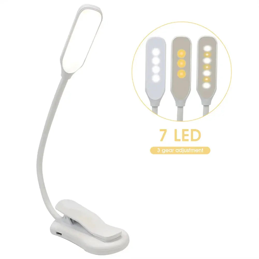 Simples Market LED Book Light, white USB-rechargeable clip-on lamp with flexible neck and 7 LEDs, 3 brightness levels.