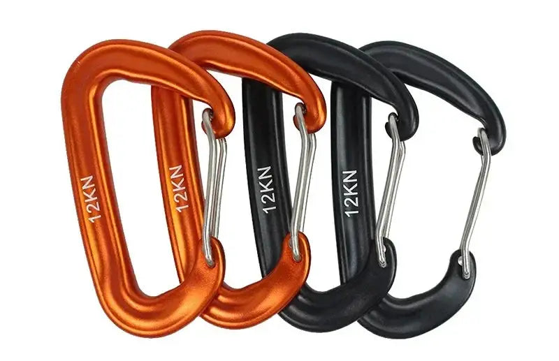 Set of four orange and black 12KN D-shaped climbing carabiners with silver gates.