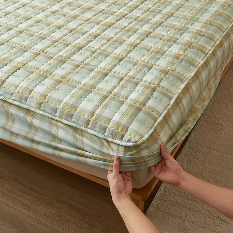 Simples Market quilted plaid mattress cover protector in pastel green; antibacterial, breathable.