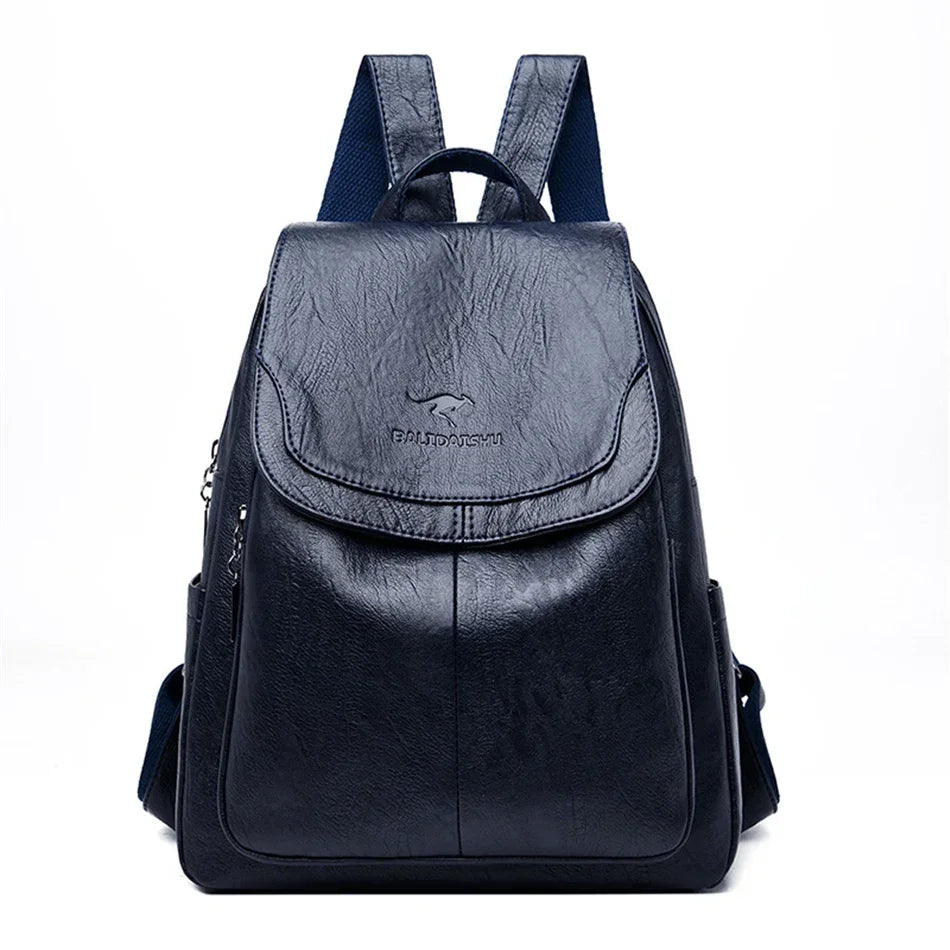 Genuine Women Soft Leather Backpack in navy blue by Simples Market with front flap and top handle