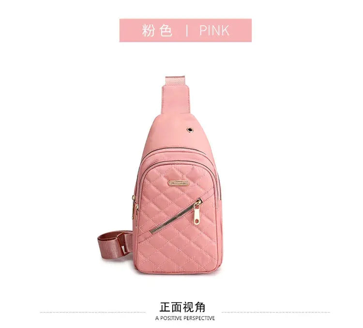 Crossbody bag in pink, quilted with adjustable strap and front zipper pocket