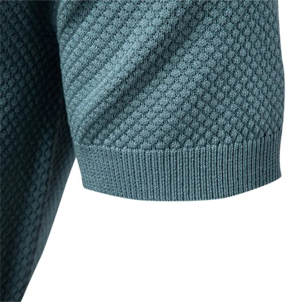 Men's golf polo shirt by Simples Market in teal textured knit with ribbed cuff.