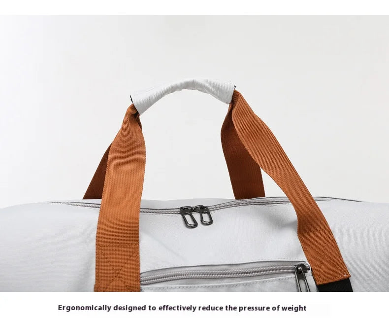 Large capacity travel gym bag by Simples Market, gray fabric with brown webbing handles and dual top zippers