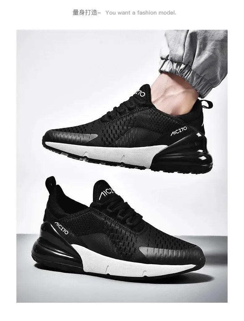 Black mesh athletic sneakers with white platform sole, breathable pair