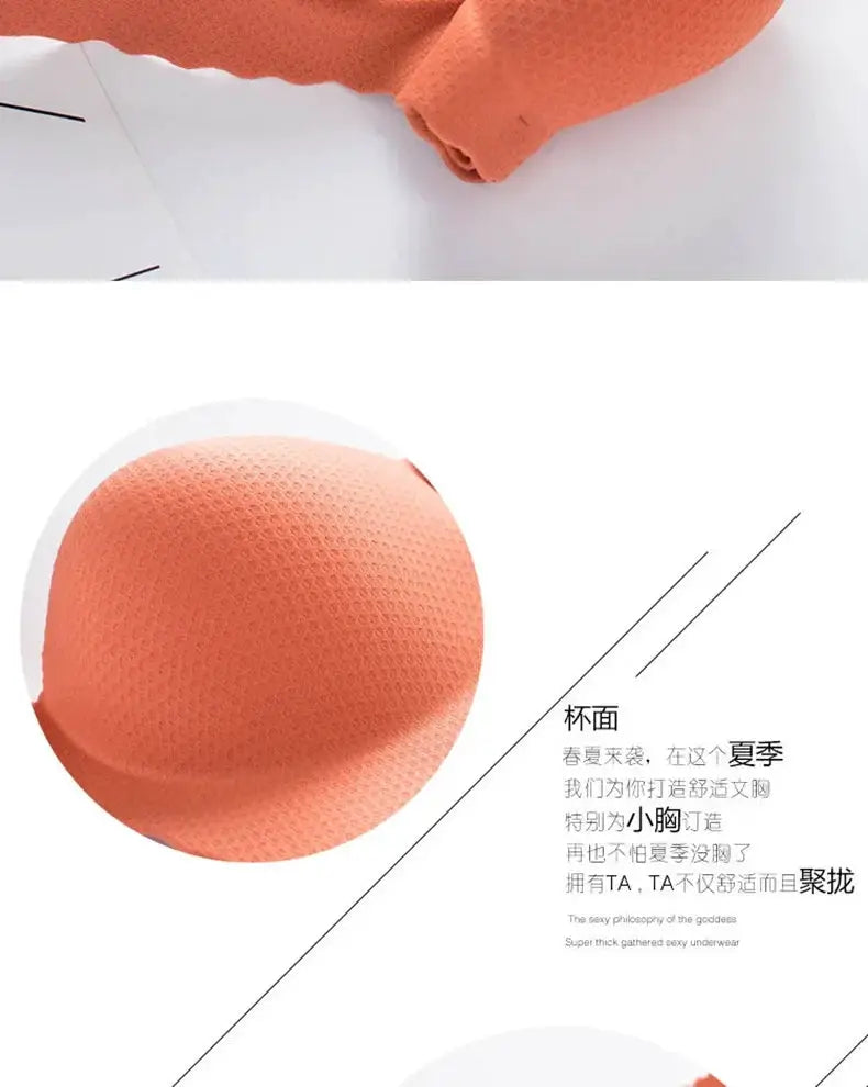 Extreme Push-Up Bra orange textured fabric close-up with wireless double-cup design