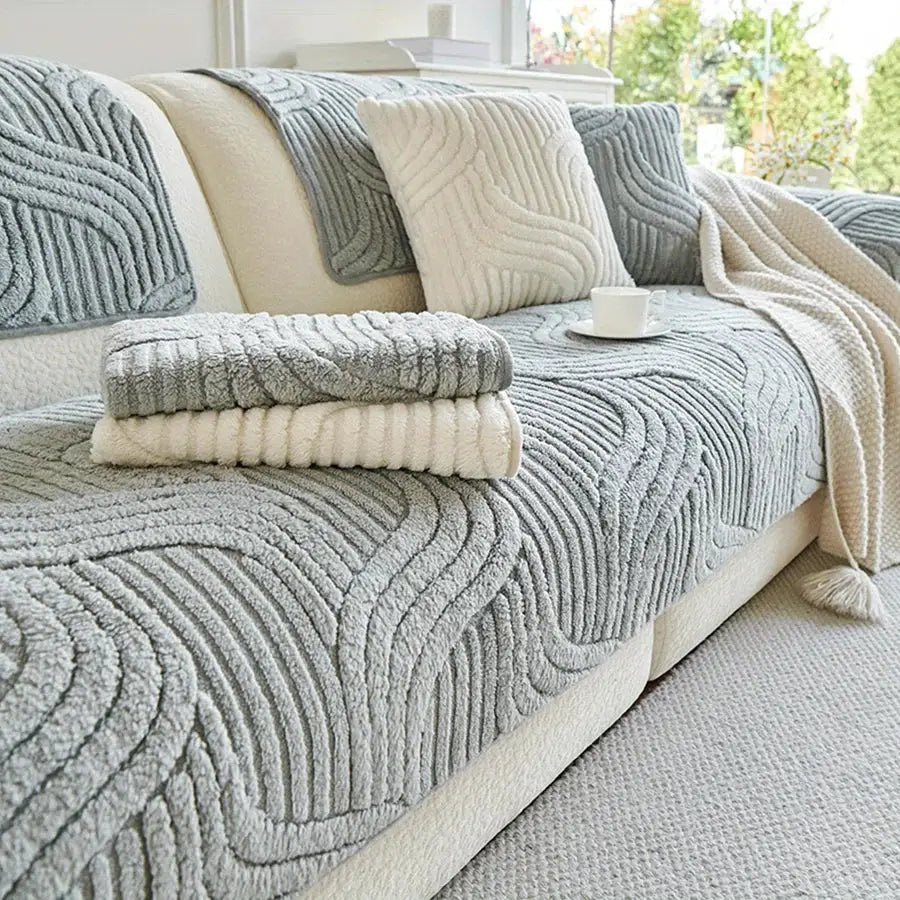 Velvet striped sofa cover by Simples Market in cream and gray on a beige sofa with cushions, non-slip.