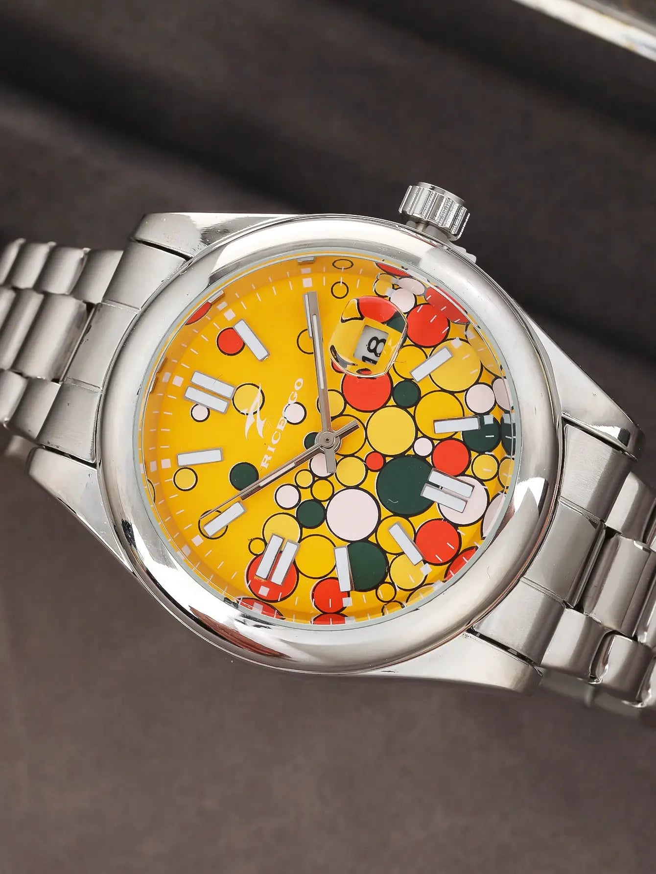 Men's quartz watch with yellow multicolor circle-pattern dial, stainless steel case and bracelet, date window