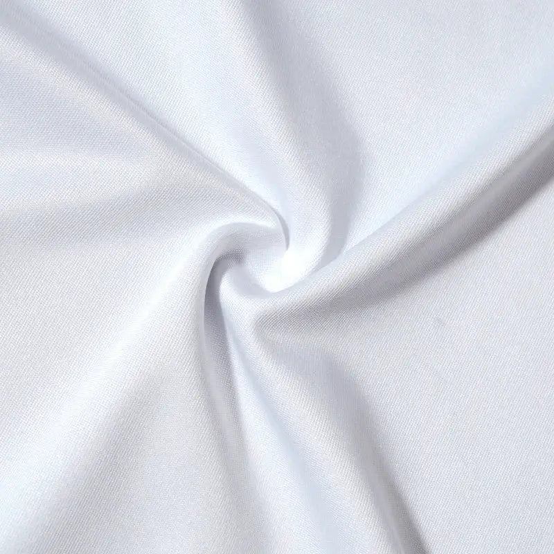 Men's compression vest fabric close-up in white; smooth, stretchy knit material