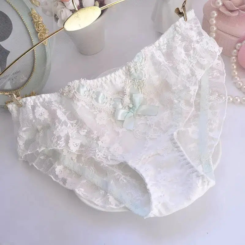 Lace panties, white with pale blue bow and ruffle trim, breathable women's underwear.