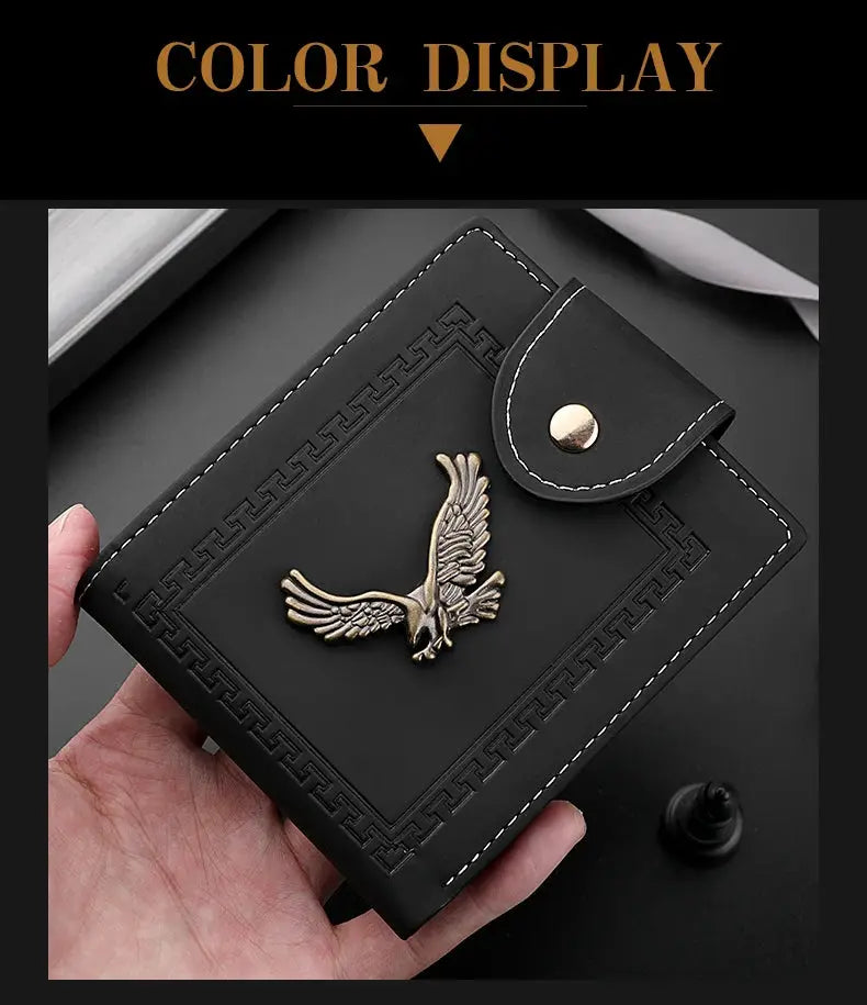 Men's black PU leather wallet with embossed gold eagle emblem and snap-flap closure, compact folding design.