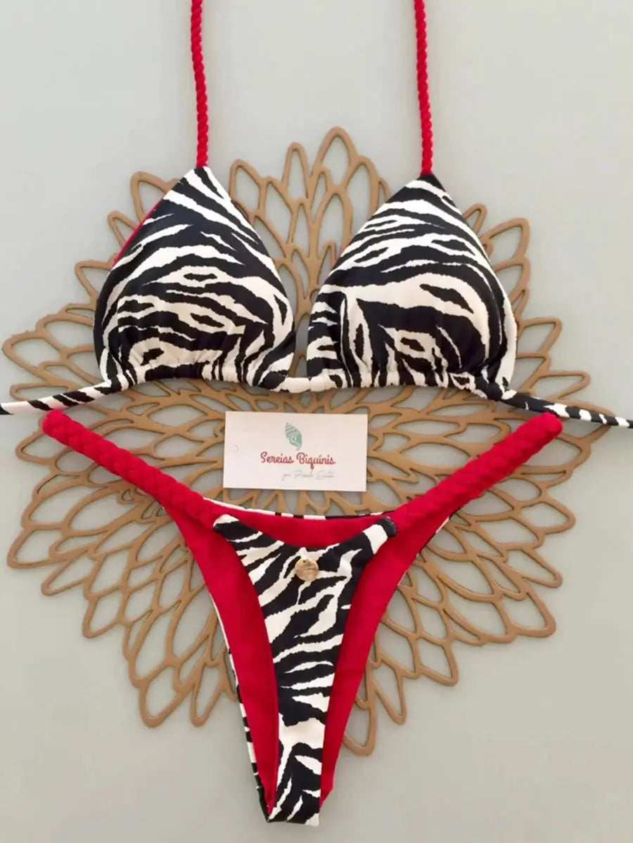 Zebra print micro bikini set with red halter straps, triangle top and thong bottom