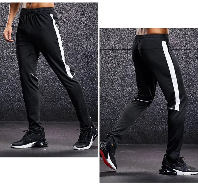 Men's black sport pants with white side stripe and zipper pockets, athletic joggers