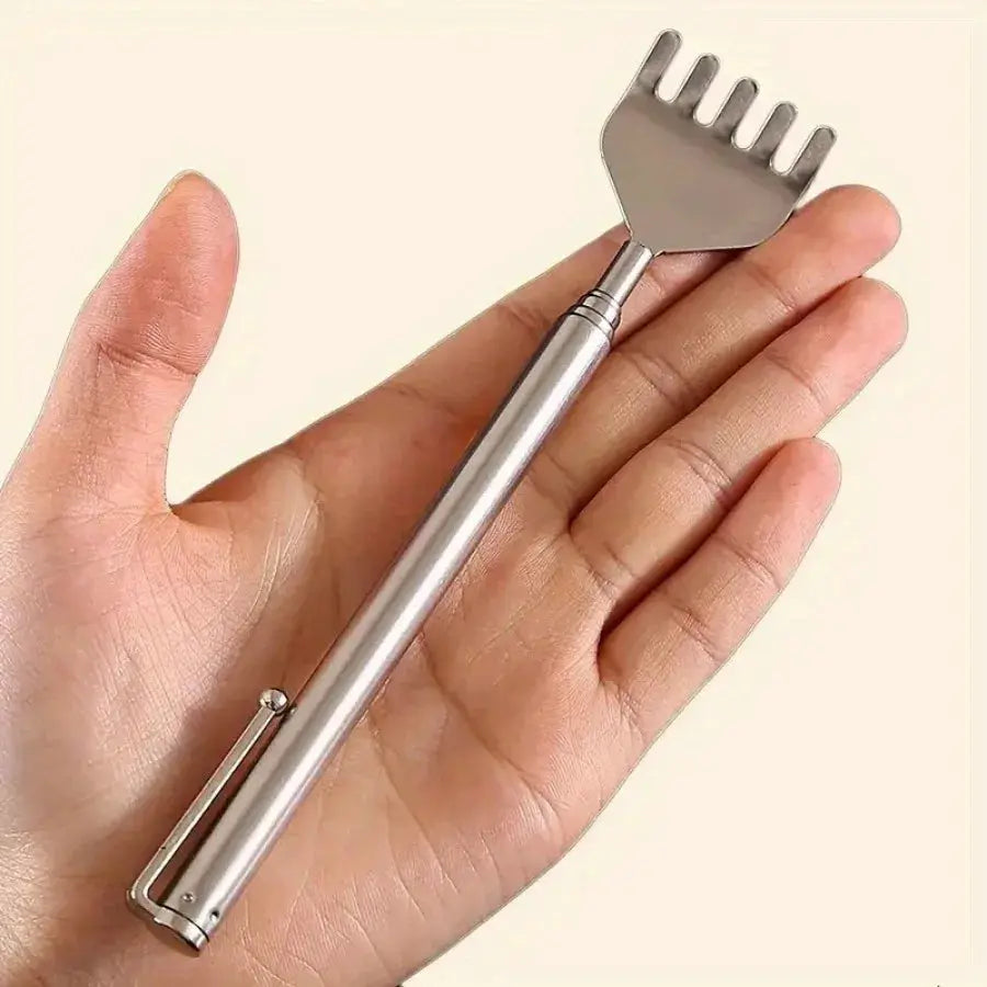 Compact telescopic back massager by Simples Market, stainless steel, extendable with four-prong head, pocket-sized