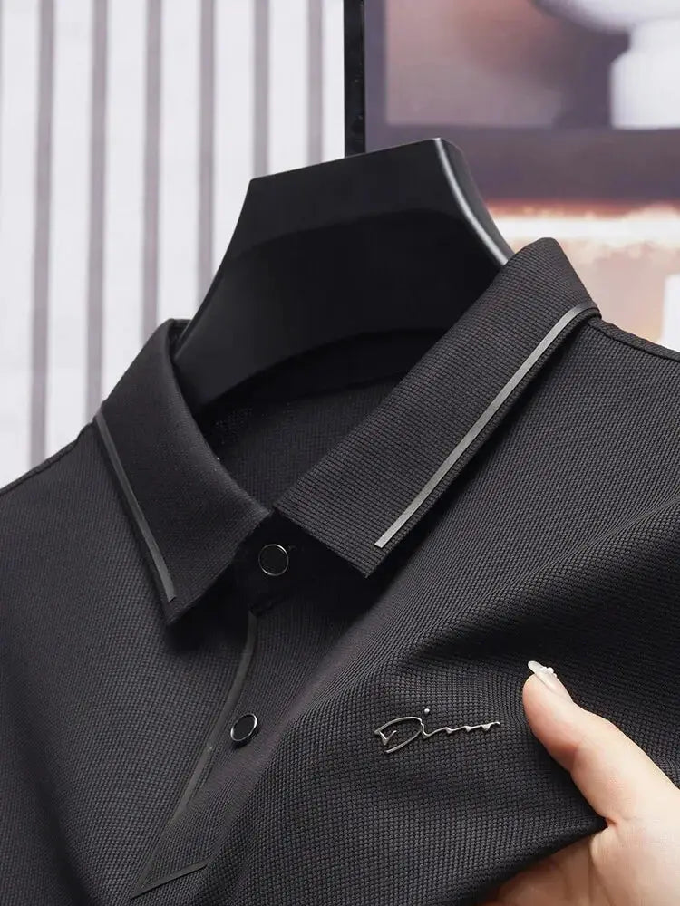 Simples Market men's polo shirt in black textured fabric with grey piping along the collar and chest logo