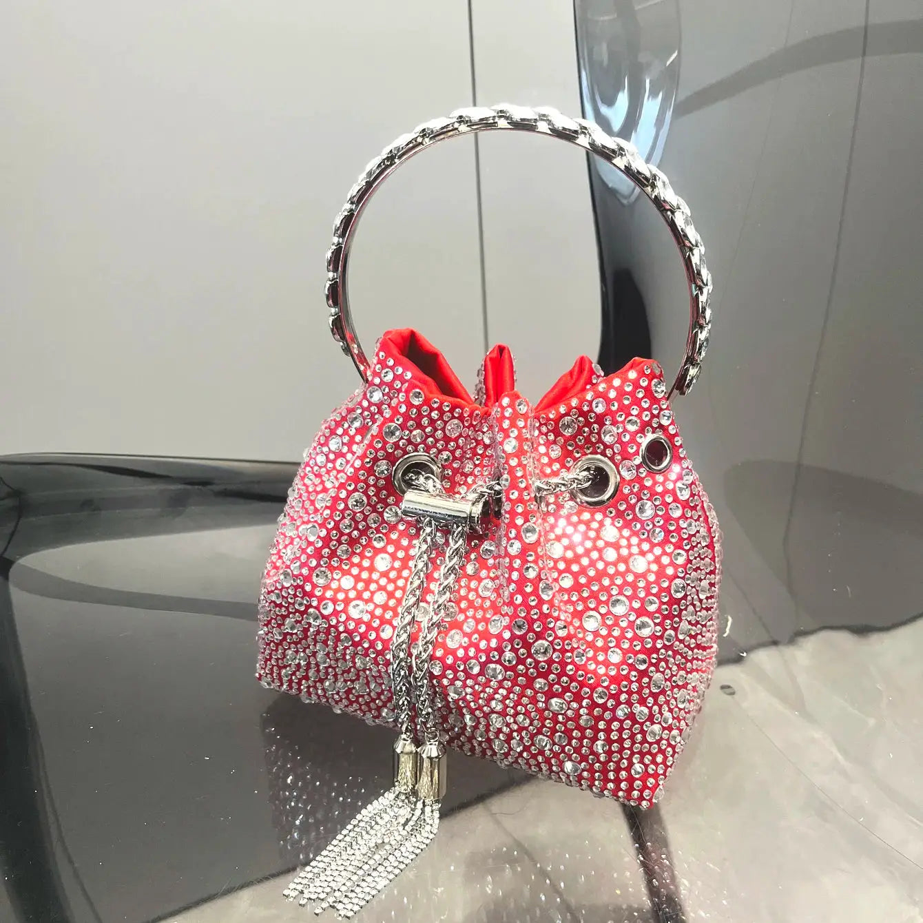 Rhinestone red evening clutch bag with crystal bow, silver chain tassel, circular crystal handle