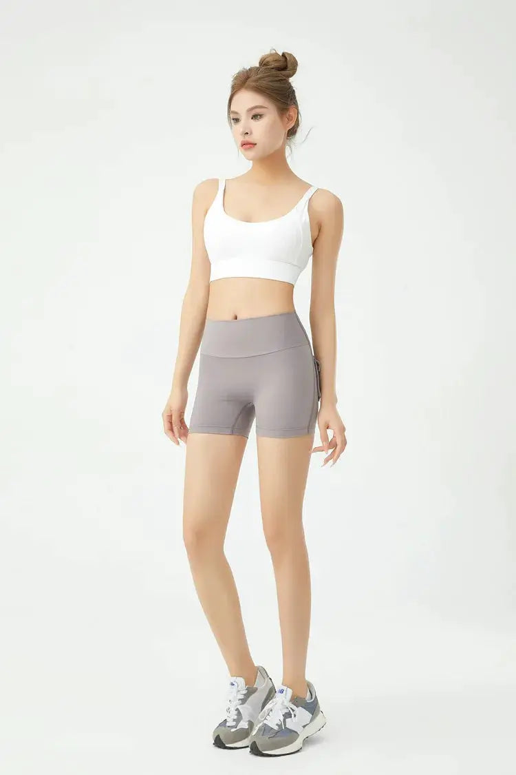 Peach Butt Fitness Shorts Women; Simples Market high-waisted grey stretch shorts with pocket for yoga and workouts.