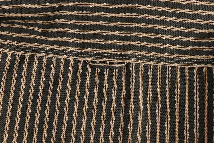 Simples Market striped long-sleeve lapel shirt fabric close-up; black and beige stripes with a small tab