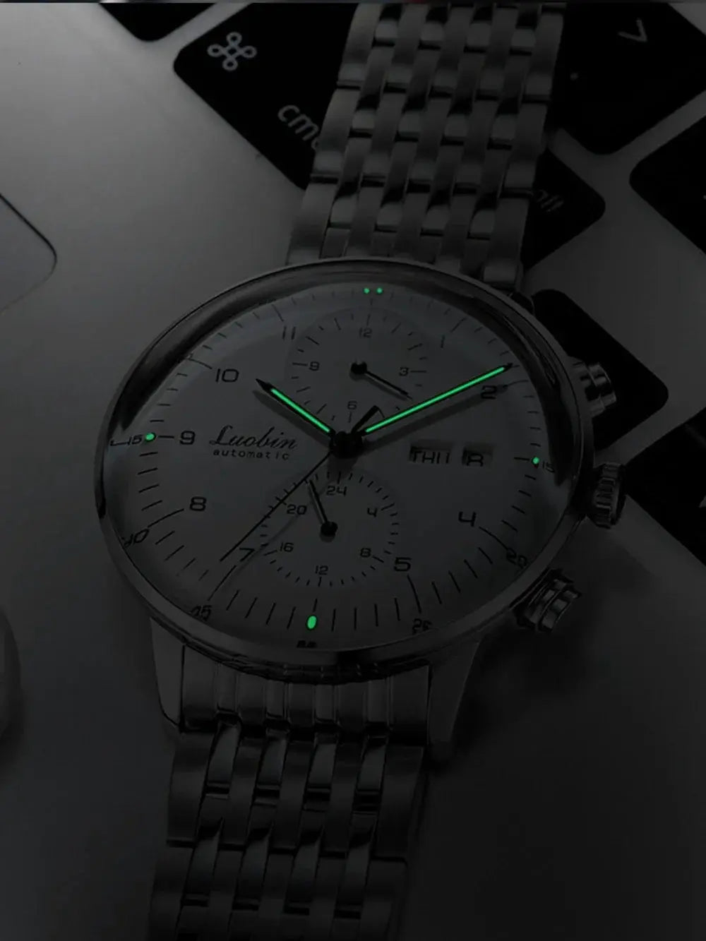 Luobin automatic men's stainless steel wristwatch with luminous green hands