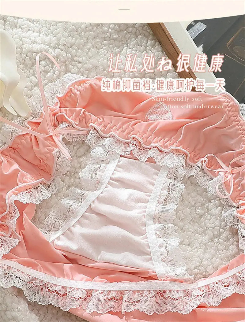 Pink lace lingerie with ruffles and bows, white cotton lining