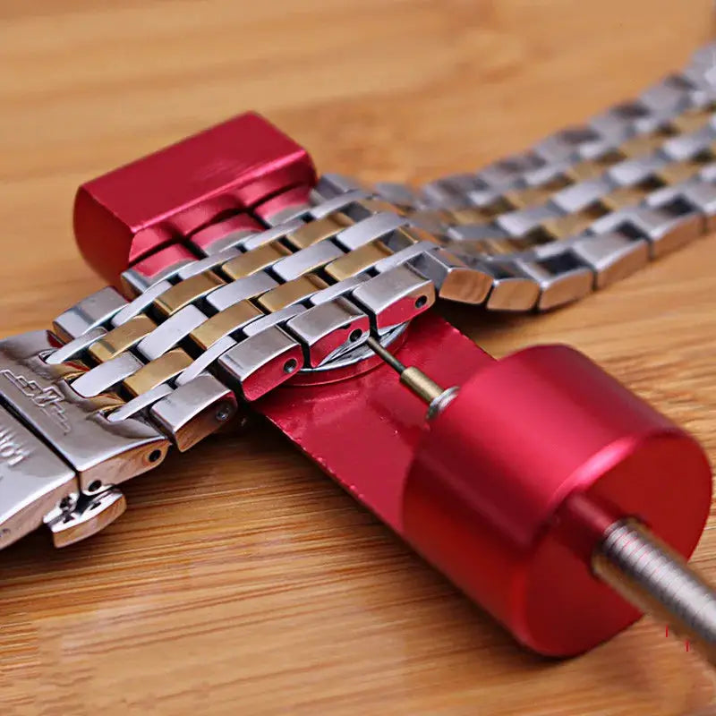 Watch link pin remover tool with red aluminum handle for metal bracelet links