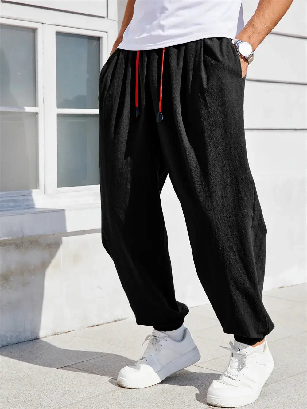 Men's loose-fit black harem pants with red drawstring, cotton-linen casual trousers