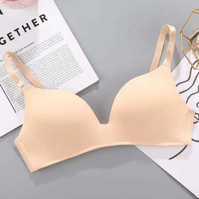 Women’s seamless nude bra with molded cups and adjustable straps, breathable fabric
