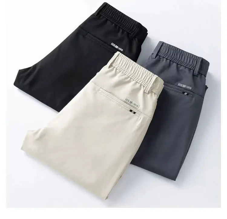 Men's stretch cotton slim casual pants in black, beige, navy; elastic waistband, back pocket details, Simples Market.